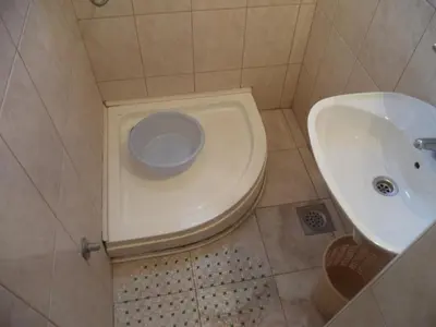 a bathroom with a toilet and a sink at Vito Apartments Sutomore in Sutomore