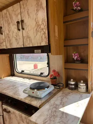 a kitchen with a stove and a counter top at A little paradise in Kotor