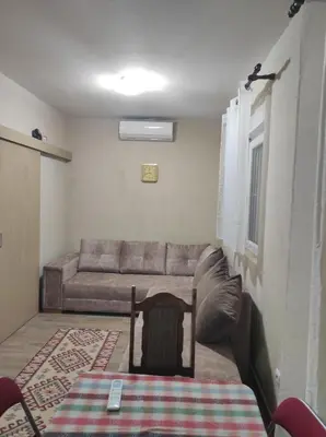 a living room with a couch and a table at Tanla in Danilovgrad