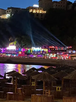 a night view of a city with lights at Ferienwohnung - Devas in Ulcinj