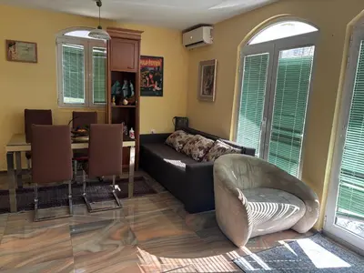 a living room with a couch and a table at Galicia Hill in Boreti