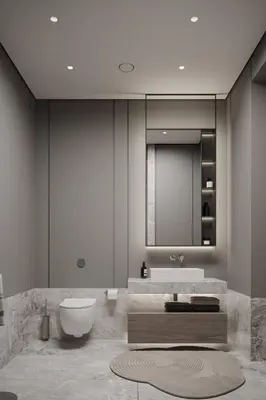 a bathroom with a sink and a toilet and a mirror at Dukley villas in Budva
