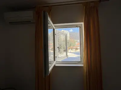 a window in a room with a view of a street at Perfect spot Petrovac in Petrovac na Moru