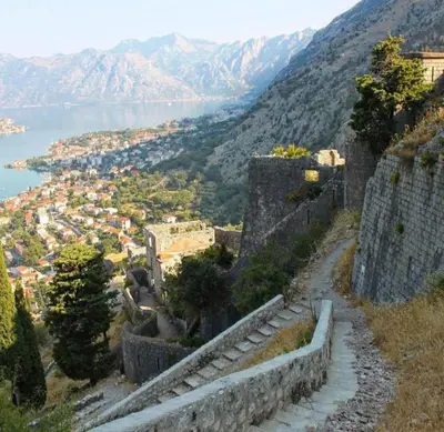 a view of a city from a mountain at lifekotor in Kotor
