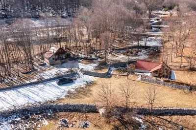 an aerial view of a house in the snow at Montenegro Rustic House I in Bjeloši