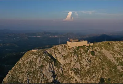 a building on the side of a mountain at Montenegro Rustic House I in Bjeloši