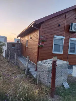 a house with a fence in front of it at Biser Štoja in Donji Štoj