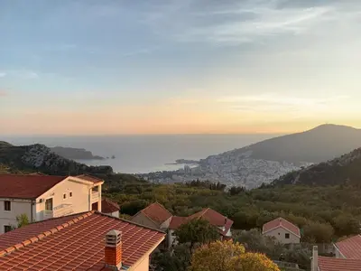 a view of the city from the roof of a house at Marcovici mountain breeze in Markovići