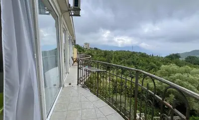 a balcony of a house with a view at Marcovici mountain breeze in Markovići