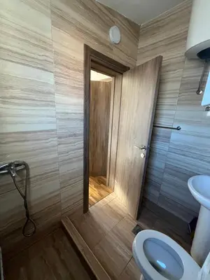 a bathroom with a toilet and a sink at Apartmani Dasic in Sutomore