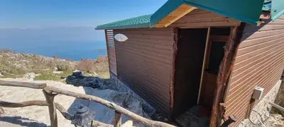 a small building with a door on the side of it at Home Livari Viewpoint in Livari
