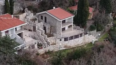 an aerial view of a house in a mountain at PerDo in Perazića Do