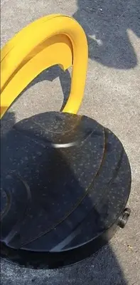 a yellow plastic object sitting on the ground at Apartments Alacritas in Budva
