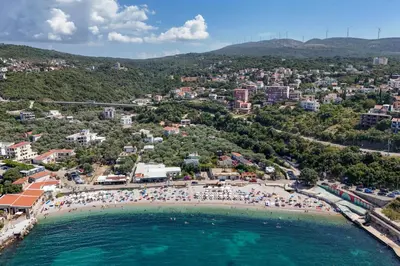 an aerial view of a beach with a crowd of people at Azzurro Apartment in Utjeha in Utjeha