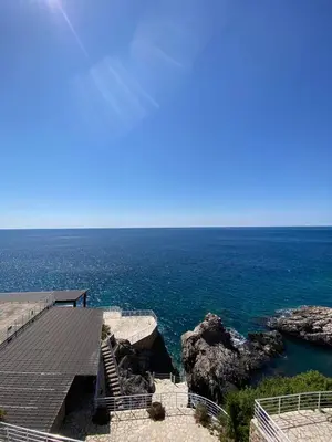 a view of the ocean from a pier at Biser mora in Dobra Voda