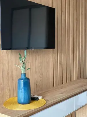 a blue vase sitting on top of a table at Morea Residence in Ulcinj