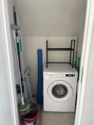 a washer and dryer in a small room at Sutomore Panorama Studio in Sutomore