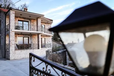 a view of a house with a skateboard on a rail at Villa Mia in Kotor