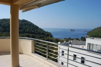 a balcony with a view of the water at Villa Nova Premium Apartment No 7 in Petrovac na Moru
