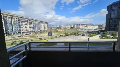 a balcony with a view of a street and a city at Central Lux in Podgorica