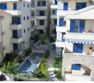 an aerial view of a city with tall buildings at Stan Rafailovici LM in Rafailovici