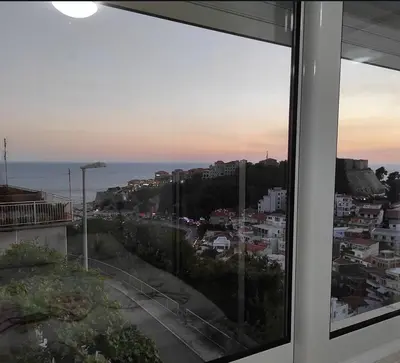 a view of a city from a window at Mediterano Apartments in Ulcinj
