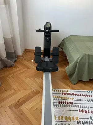 a camera on a tripod in a room with a bed at Cozy & Sunny 2-bedroom in best location in the city in Podgorica