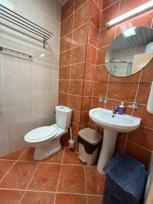 a bathroom with a toilet and a sink at Happy Time Studio in Petrovac na Moru