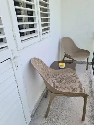two chairs and a table in a room at Casa-Cristiano in Sutomore