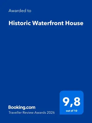 a screenshot of a phone with the text upgraded to historic waterfront house at Historic Waterfront House in Muo