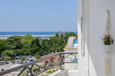 a balcony with a view of a city at Adriatic Lux Apartment in Bar