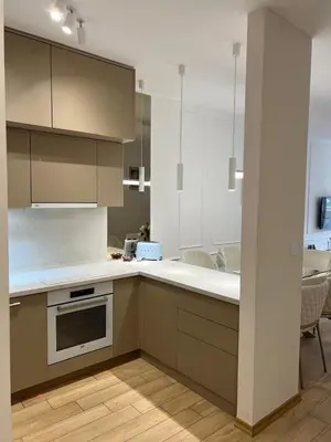 a kitchen with a sink and a counter top at Luxury apartment with garage in Old bakery in Budva