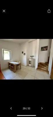 a living room with a table and a tableasteryasteryasteryasteryasteryasteryastery at Njaro del Mar 17 in Petrovac na Moru