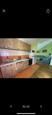 a kitchen with a sink and a counter top at Njaro Del Mar 18 in Petrovac na Moru
