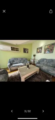 a living room with two couches and a coffee table at Njaro Del Mar 18 in Petrovac na Moru