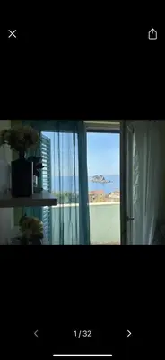a picture of a window with a view of the ocean at Njaro Del Mar 18 in Petrovac na Moru