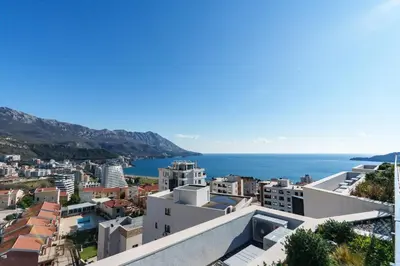 a view of the city and the ocean at Sunshine Appartement Budva in Becici