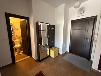 a bathroom with a walk in shower and a toilet at Velvet apartment Petrovac in Petrovac na Moru