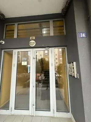 a entrance to a building with glass doors at 2 bedroom apartment blok 9 in Podgorica