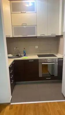 a kitchen with a sink and a stove at 2 bedroom apartment blok 9 in Podgorica