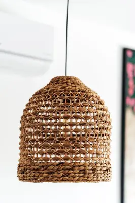 a brown straw hat hanging from a wall at Vuelo Sobre by In Property in Becici