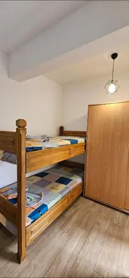 a room with two bunk beds in a room at Bulevar Apartments in Ulcinj