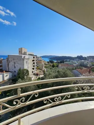 a balcony with a view of a city at Tirke Apartment in Becici