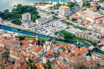 an aerial view of a city with red roofs at Apartment Nikolic Kotor in Kotor