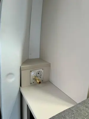 a small box sitting on a shelf in a room at Eagle's path campers Montenegro in Podgorica