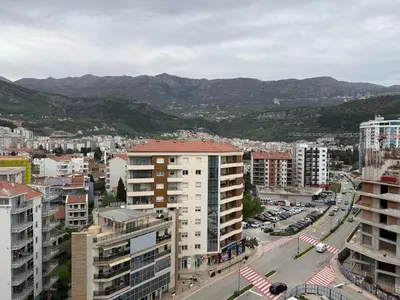 an aerial view of a city with buildings at Apartment WOW Budva - With free parking in Budva