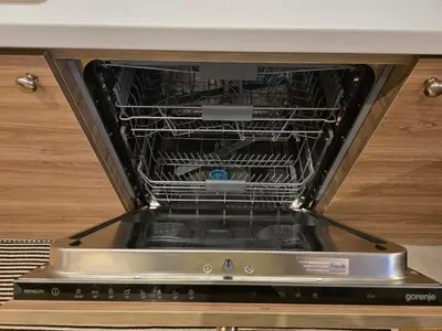 an oven with its door open in a kitchen at Peaceful 2bd apartment near Sveti Stefana in Pržno
