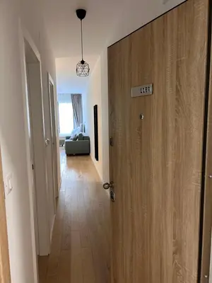 a hallway with a door with a sign that reads keep at Sea La Vie in Bar