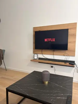 a tv sitting on top of a wall at Sea La Vie in Bar