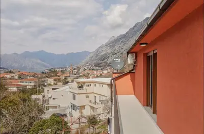 a view of a city from a balcony of a building at Apartmani Nadja in Škaljari